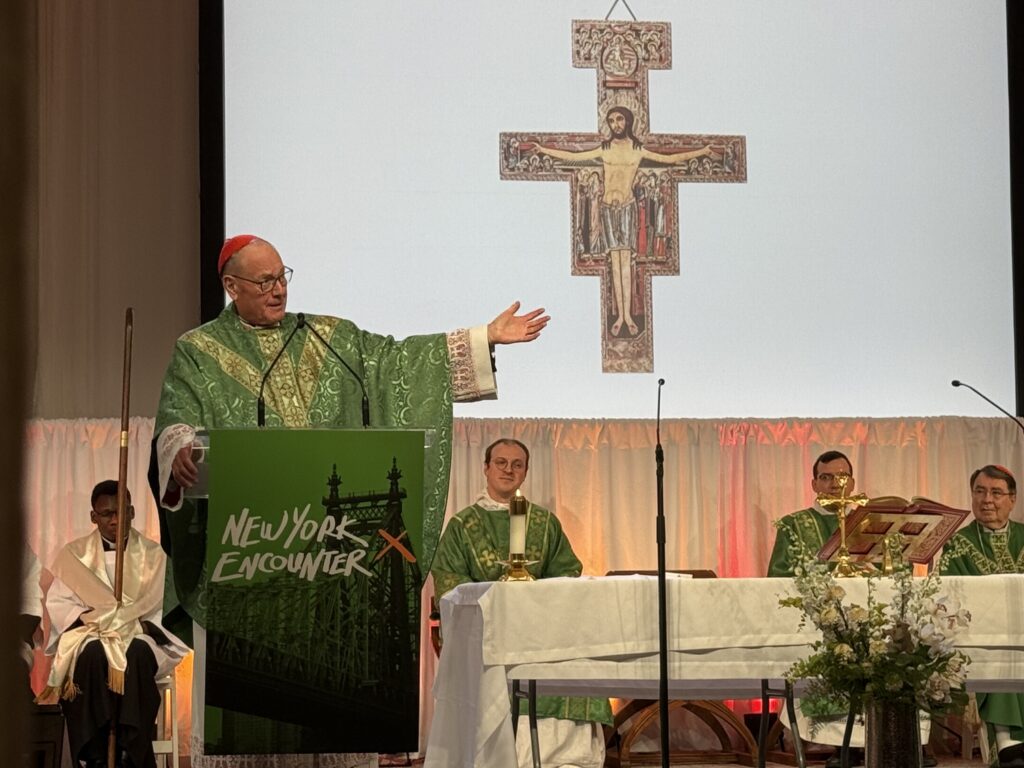 Cardinal Timothy Dolan delivers his homily at Mass at the New York Encounter, February 15, 2026, in the Chelsea section of Manhattan. At right is Cardinal Christophe Pierre, apostolic nuncio to the United States.