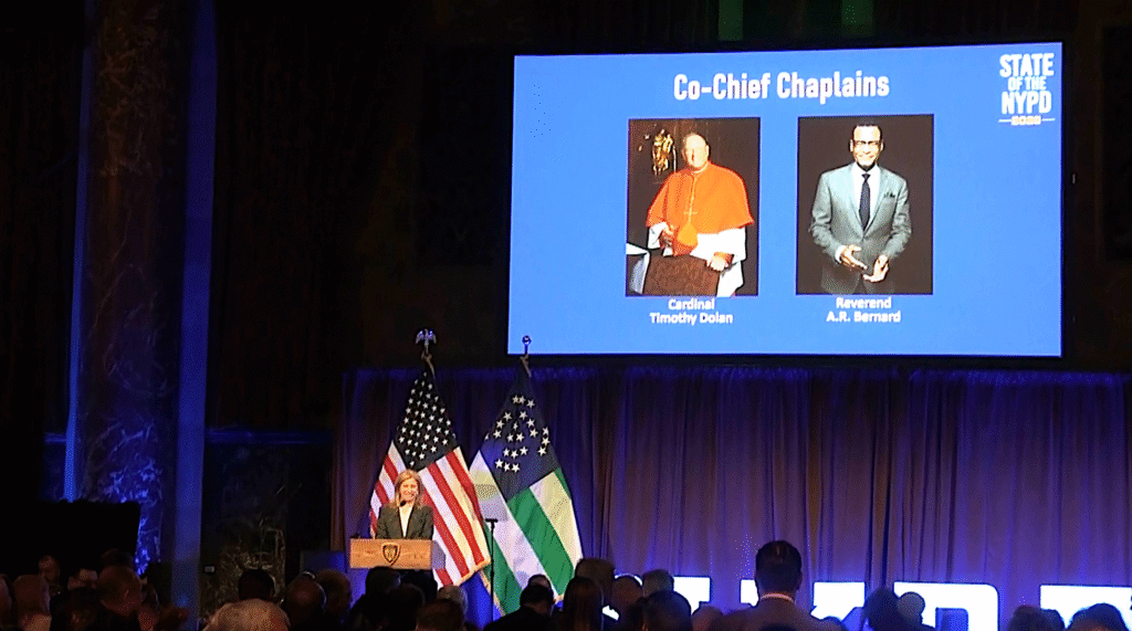 New York Police Department Commissioner Jessica Tisch (at podium) introduces Cardinal Timothy Dolan and Reverend A.R. Bernard as the new co-chief chaplains of the NYPD, at the State of the NYPD address in Manhattan, February 10, 2026.