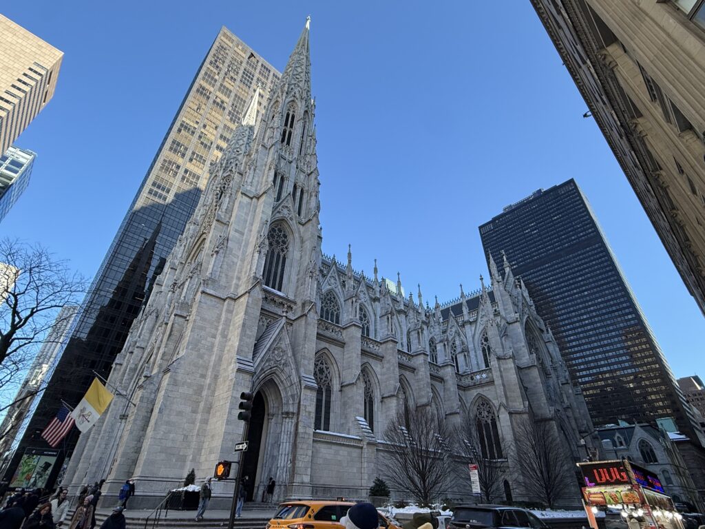 Saint Patrick's Cathedral towers over Fifth Avenue on the afternoon of February 2, 2026.