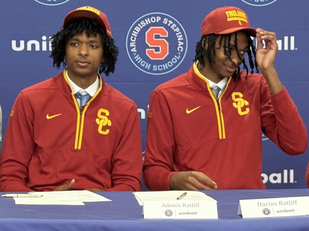 Adonis Ratliff (left) and Darius Ratliff sign their letters of commitment to play basketball the University of Southern California, November 13, 2025, at Archbishop Stepinac High School in White Plains.