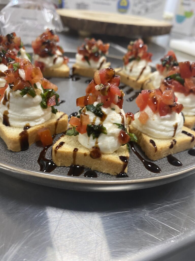 A plate of goat cheese bruschetta prepared by certified executive chef Jim Churches, president of the American Culinary Federation's Michigan Chefs de Cuisine Association and a member of St. Patrick Parish in Brighton, Michigan, is seen in this undated photo.