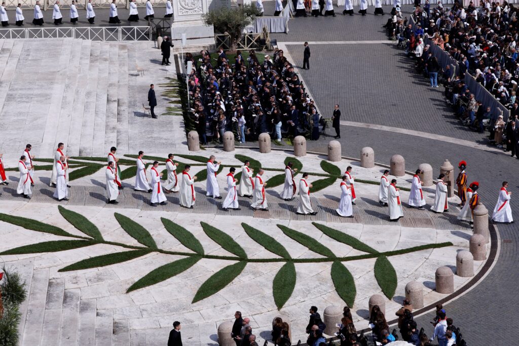 Members of the clergy attend the Palm Sunday Mass celebrated by Pope Leo XIV in St. Peter's Square at the Vatican, March 29, 2026.