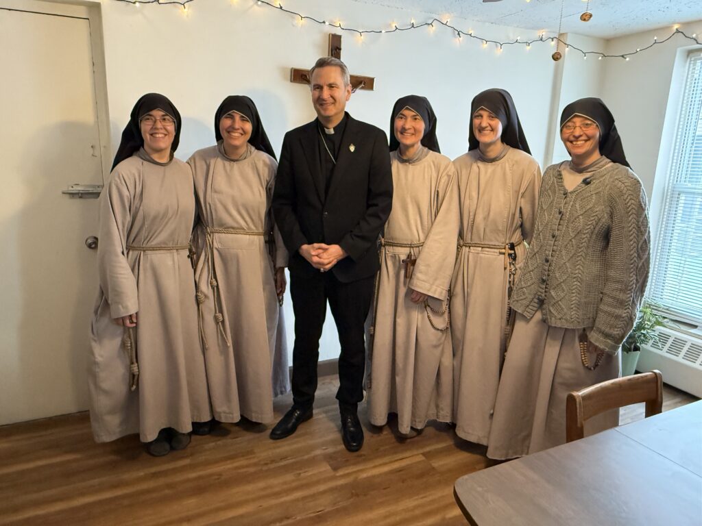 Archbishop Ronald Hicks (center) spent time with the Community of the Franciscan Friars of the Renewal in his first pastoral visit on February 11, 2026.