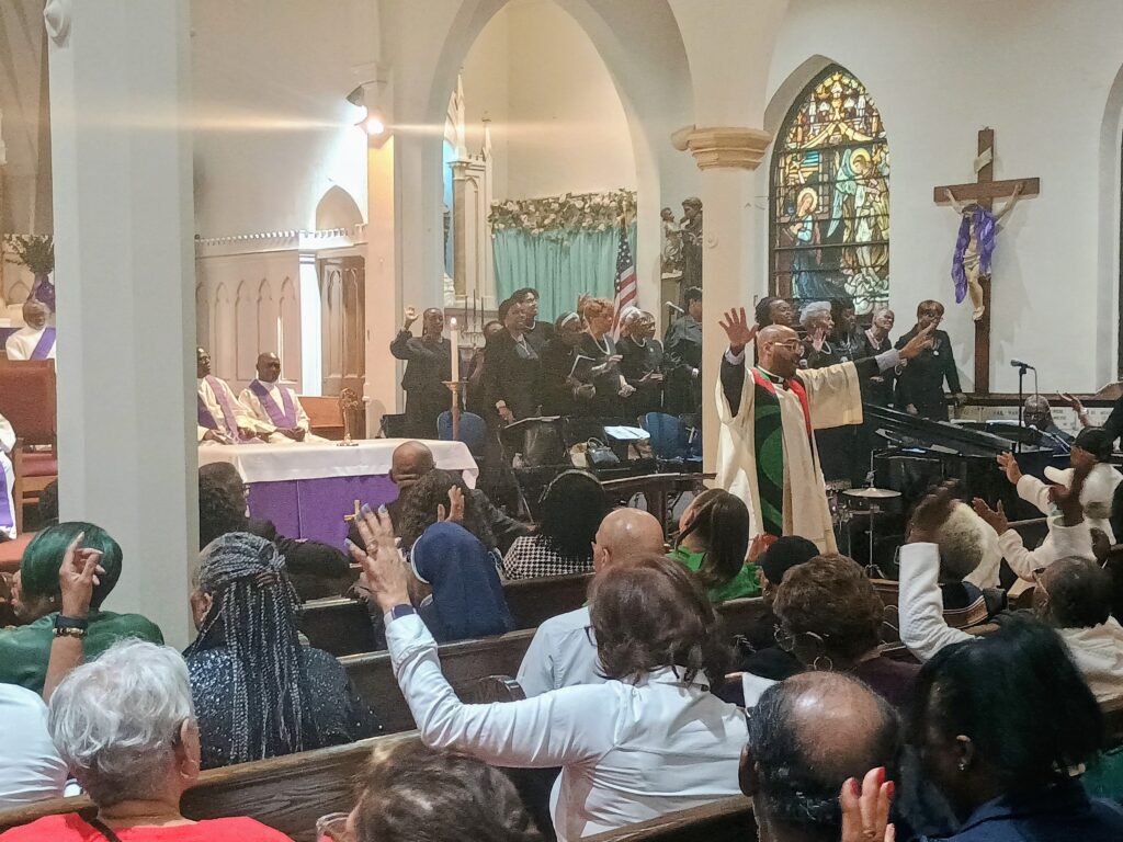 Father Kareem Smith and the choir lead the faithful in singing songs of praise during the 2026 Central Harlem Catholic Revival, celebrated at St. Mark the Evangelist Church, Sunday, March 8, 2026