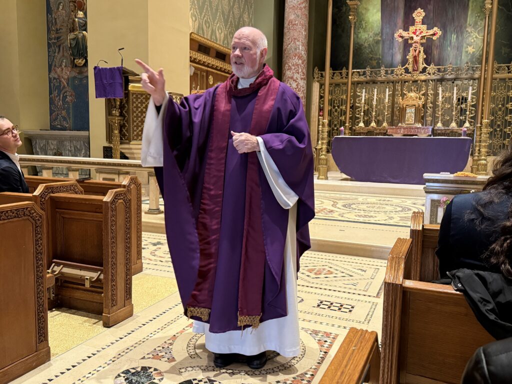 Monsignor Kevin Sullivan celebrates a Mass in memory of people who died unhoused, organized by the Community of Sant’Egidio at the Church of Our Saviour in Manhattan, March 14, 2026.