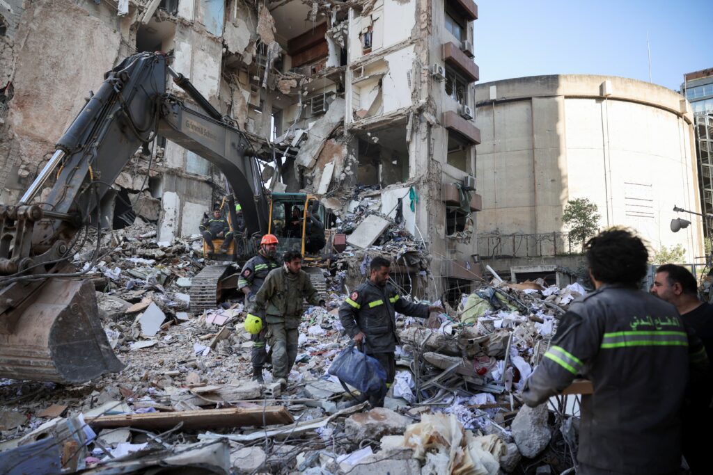 Rescuers work at the site of an Israeli airstrike in Beirut April 9, 2026, that was carried out the previous day. As the ceasefire between the United States and Iran risked collapsing due to disagreements, Israel pressed on with its attack on alleged Hezbollah targets in Lebanon, killing at least 254 people and wounding hundreds more. Photo: OSV News/Louisa Gouliamaki, Reuters
