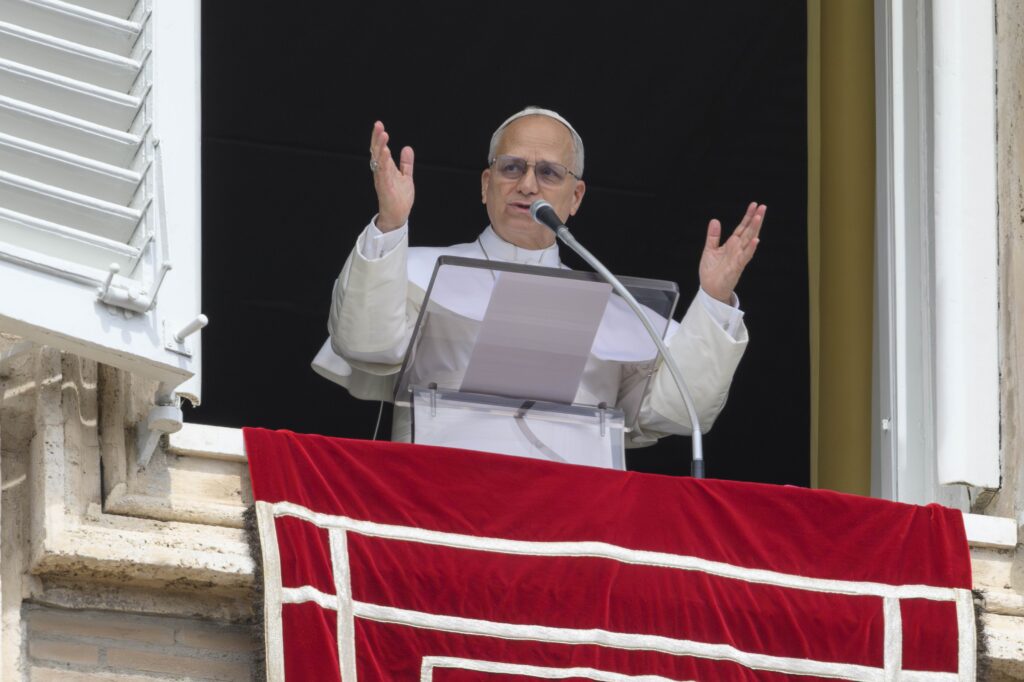 Pope Leo XIV gestures while leading the "Regina Caeli" prayer in St. Peter's Square at the Vatican April 12, 2026.
