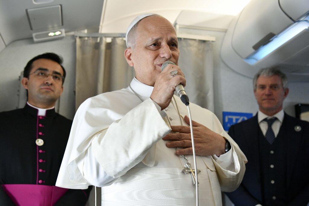 Pope Leo XIV speaks to reporters aboard the papal flight from Rome to Algeria April 13, 2026.