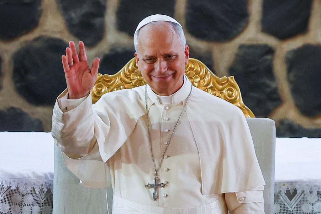 Pope Leo XIV waves as he attends a Meeting for Peace at St. Joseph's Cathedral in Bamenda, Cameroon, April 16, 2026.