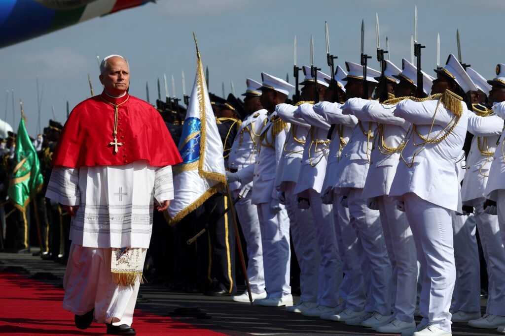 Pope Leo XIV walks after arriving at Quatro de Fevereiro International Airport to begin his apostolic journey to Angola, in Luanda, Angola, April 18, 2026.