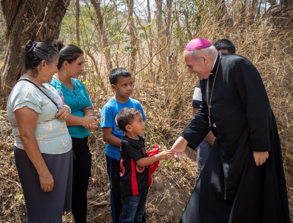 Archbishop Luigi Roberto Cona, apostolic nuncio to El Salvador, visits El Nance hamlet in Metalío canton, which is part of the Diocese of Sonsonate, on March 13, 2026, to talk to community members benefiting from a safe water project launched by the nuncio and Catholic Relief Services.