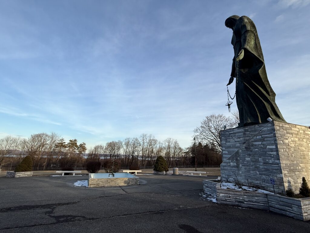 A 48-foot statue of Our Lady of the Rosary looks down on a courtyard at the National Shrine of Mary Help of Christians in Stony Point, January 30, 2025.