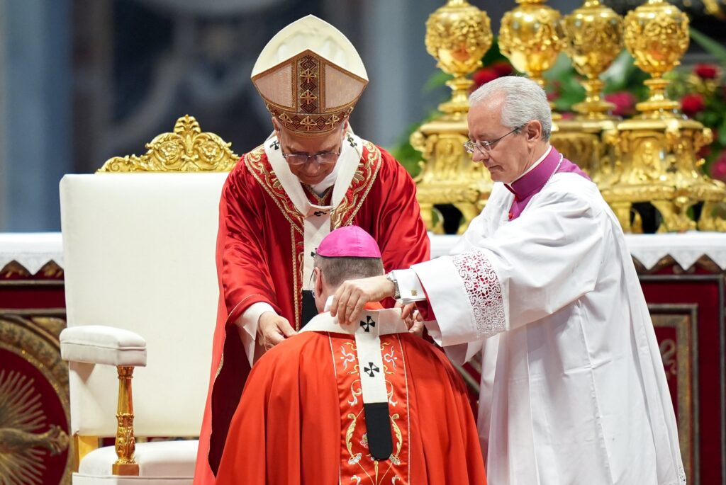Pope Leo XIV presents the pallium to Archbishop W. Shawn McKnight of Kansas City, Kan., during Mass in St. Peter’s Basilica at the Vatican June 29, 2025, the feast of Sts. Peter and Paul.