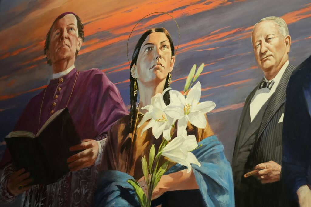 St. Kateri Tekakwitha (center) is depicted in a section of a 25-foot-high, four-panel mural as seen in the narthex of St. Patrick's Cathedral in Manhattan on Sept. 18, 2025, the date of the artwork's formal unveiling.