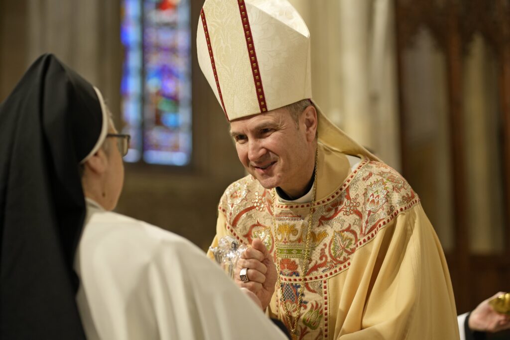 Archbishop of New York Ronald A. Hicks receives the gifts during the annual White Mass at St. Patrick’s Cathedral in Manhattan on June 3, 2026.