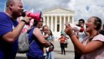 A pro-life activist and a supporter of legal abortion square off with megaphones in front of the U.S. Supreme Court in Washington June 24, 2023, the first anniversary the court's 2022 ruling in Dobbs v. Jackson Women's Health Organization, overturning Roe v. Wade, which legalized abortion nationwide in 1973. On the fourth anniversary of Dobbs June 24, 2026, the U.S. bishops' pro-life chair and pro-life leaders pointed to abortion pills as among key challenges for protecting the lives of unborn children.