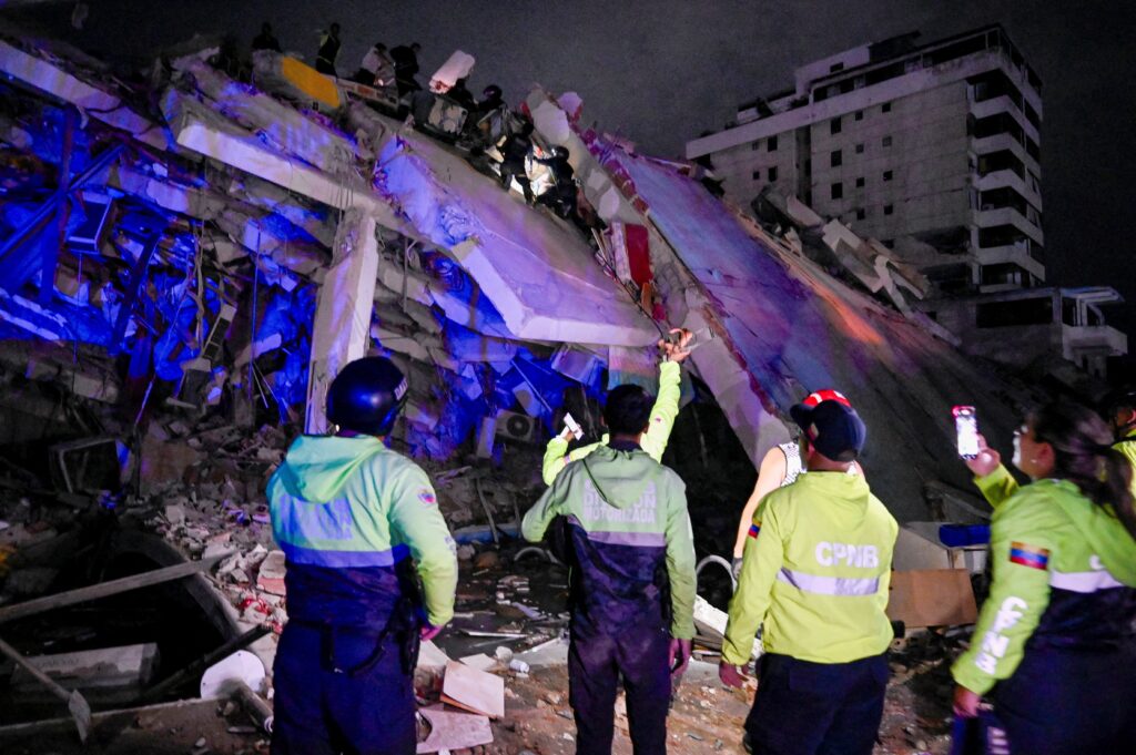 Emergency workers are seen at a damaged building in La Guaira, Venezuela, June 24, 2026, following 7.2 and 7.5 magnitude earthquakes that rocked the country. More than 150 people have died and hundreds have been injured, Acting President Delcy Rodríguez said June 25, adding that rescue teams were rushing to the hardest-hit areas to free people trapped under rubble.