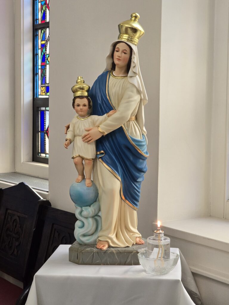 A statue of Mary stands at Holy Cross Church in the Bronx in this undated photo.