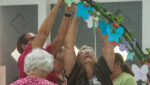 Women wrote their intentions on paper butterflies that were then hung on an arch during Women’s Day at Graymoor in 2025. The paper butterflies were blessed later in the retreat.
