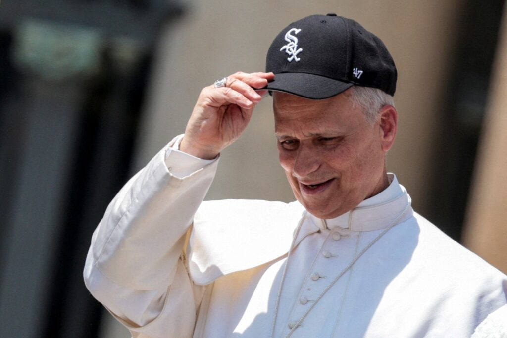 Pope Leo XIV wears a Chicago White Sox baseball cap during his weekly general audience in St. Peter's Square at the Vatican June 11, 2025.