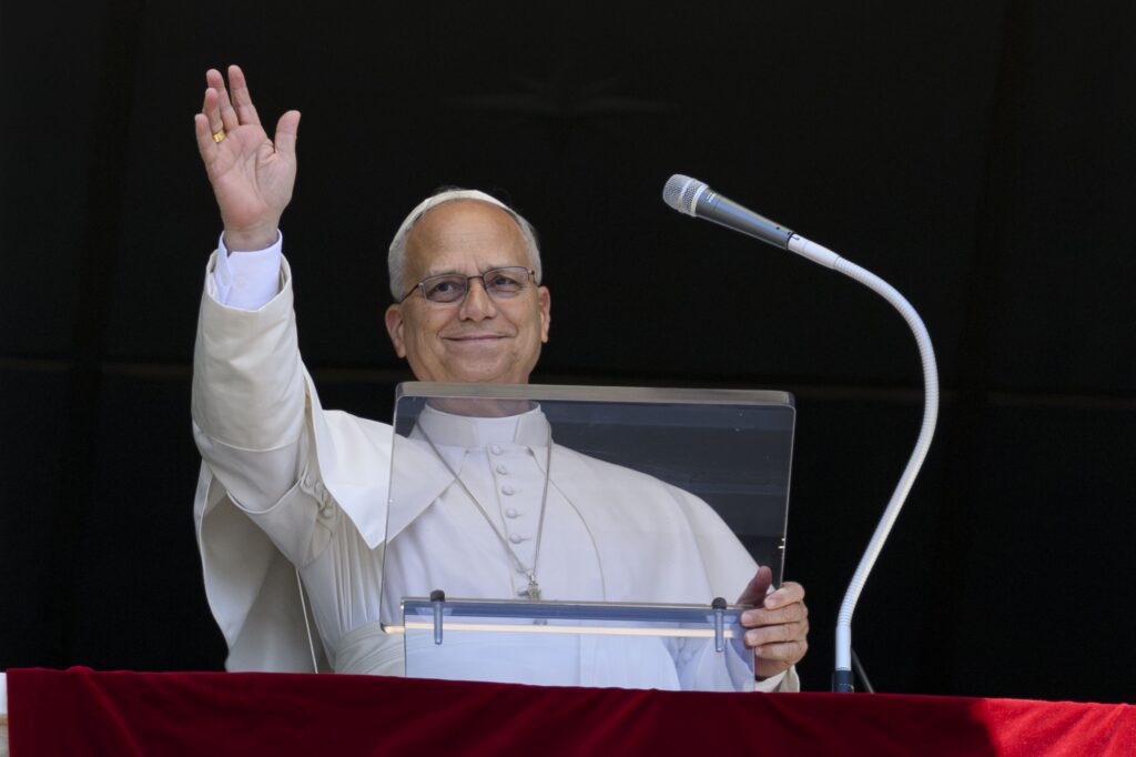 Pope Leo waves after leading the Angelus prayer from a window of the Apostolic Palace at the Vatican on July 5, 2026.