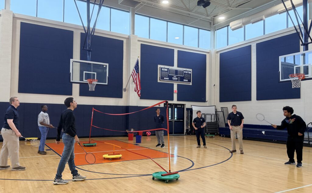 Students from Seton Hall Prep in West Orange, N.J., play badminton with students at Academy360 in Livingston during a Spectrum Big Brothers gathering in an undated photo. Launched in 2007, Spectrum Big Brothers was created as a rare opportunity for Seton Hall Prep's students to form genuine relationships with teens and young adults with autism.