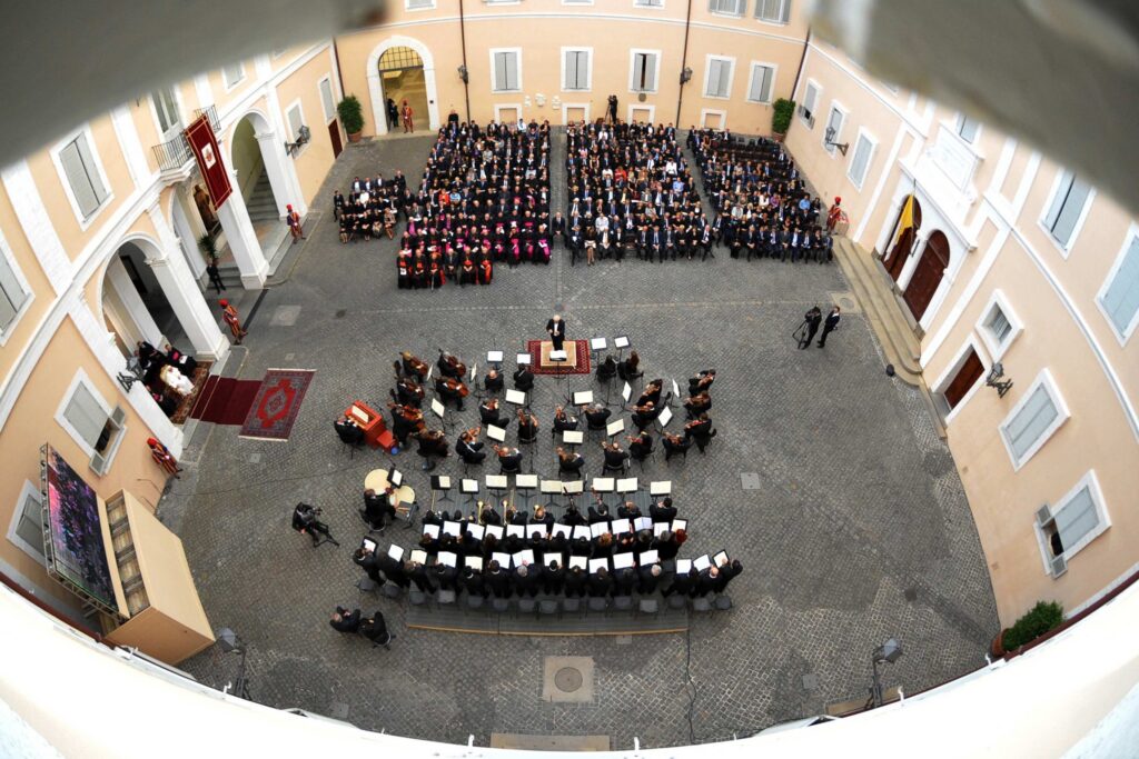 Pope Benedict XVI listens to a concert organized by the Pontifical Academy of Sciences in the courtyard of his summer residence in Castel Gandolfo, Italy, Sept. 7, 2010. Pope Leo XIV will attend a concert offered in his honor July 18, 2026, in the courtyard at the Apostolic Palace of Castel Gandolfo.