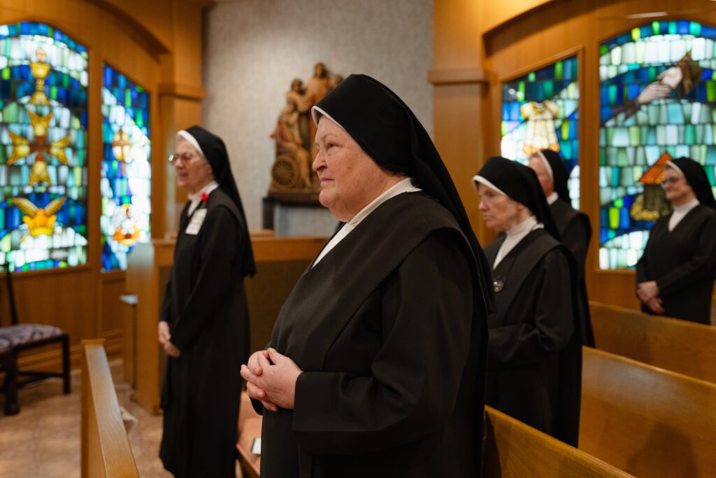 Carmelite Sisters pray in the chapel at Ozanam Hall in Bayside, Queens. Four orders of women religious and Catholic healthcare ministries filed suit in federal court in Albany July 17, 2026, arguing that New York’s new assisted dying law would force them to choose between their faith and their ability to provide care for the sick, the elderly, and the dying.