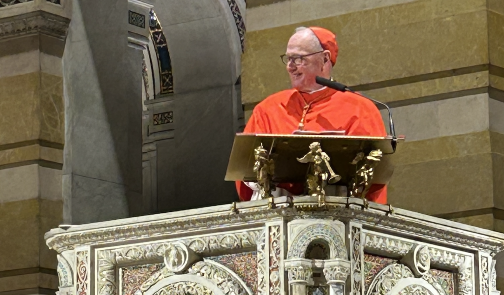 Cardinal Timothy Dolan smiles from the pulpit of the Cathedral Basilica of St. Louis on July 18, 2026. Cardinal Dolan gave the homily during the Archdiocese of St. Louis’ bicentennial Mass.