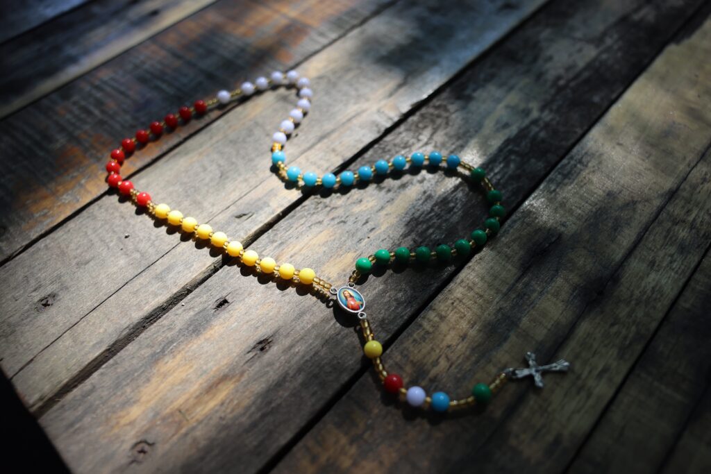 A World Mission Rosary, seen in a file photo, is identified by the color-coded decades that represent the five mission territories of Africa, Oceania, Europe, the Americas and Asia. The World Mission Rosary was designed by Venerable Fulton J. Sheen, who served as national director of the Pontifical Mission Societies. On May 1, 2026, the mission organization issued a call for rosaries, asking individuals and groups to make and donate 1,000 or more rosaries to reach of goal of more that 70,000, which will be given to those who attend the beatification of Archbishop Sheen Sept. 24.