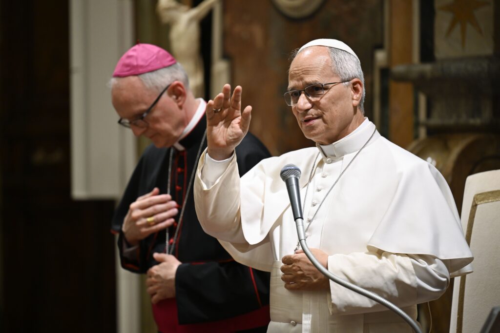 Pope Leo XIV gives a blessing as he meets with participants of the XVII Annual Meeting of International Catholic Legislators Network at the Vatican, Aug. 21, 2026.
