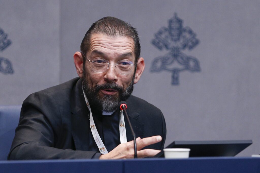Bishop Daniel E. Flores of Brownsville, Texas, speaks at a news conference in the Vatican press office Oct. 3, 2024, during the Synod of Bishops.