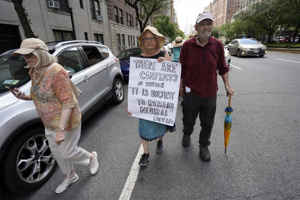 Martha Hennessy, center, granddaughter of Dorothy Day, and fellow human rights advocates participate in an outdoor procession organized by the New York chapter of Catholics in Communion on the feast of the Most Holy Body and Blood of Christ in the Upper East Side on June 7, 2026.