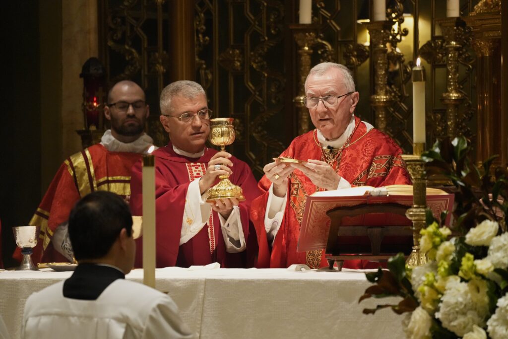 Cardinal Pietro Parolin, right, Vatican Secretary of State, and Archbishop Christophe-Zakhia el-Kassis, the Holy See's new permanent observer to the United Nations in New York, elevate the Eucharist during Mass at the Church of Our Saviour in Manhattan on Sept. 21, 2026, the feast of St. Matthew and the International Day of Peace. Cardinal Parolin is scheduled to address the U.N. General Assembly on Sept. 26. (OSV News photo/Gregory A. Shemitz)