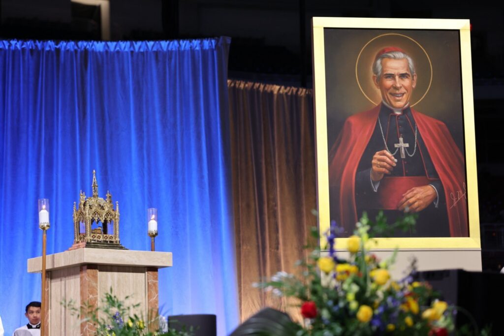 A first-class relic of Blessed Fulton J. Sheen is displayed next to his official portrait at his beatification Mass Sept. 24, 2026, at The Dome at America's Center in St. Louis.