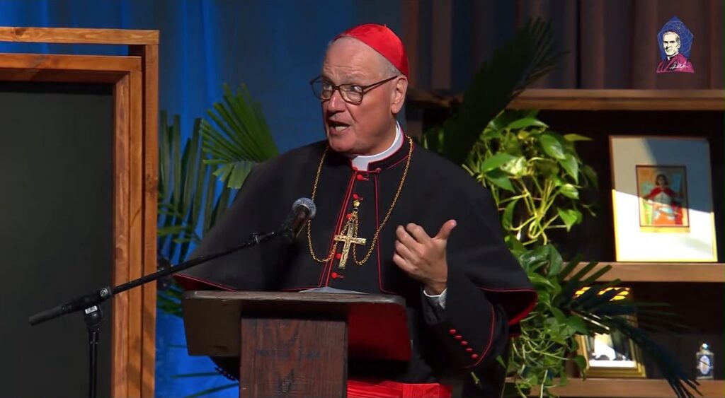 Cardinal Timothy Dolan gestures during his presentation on Fulton Sheen and the Eucharist at the pre-Mass show for the beatification of Archbishop Fulton J. Sheen, Sept. 24, 2026.