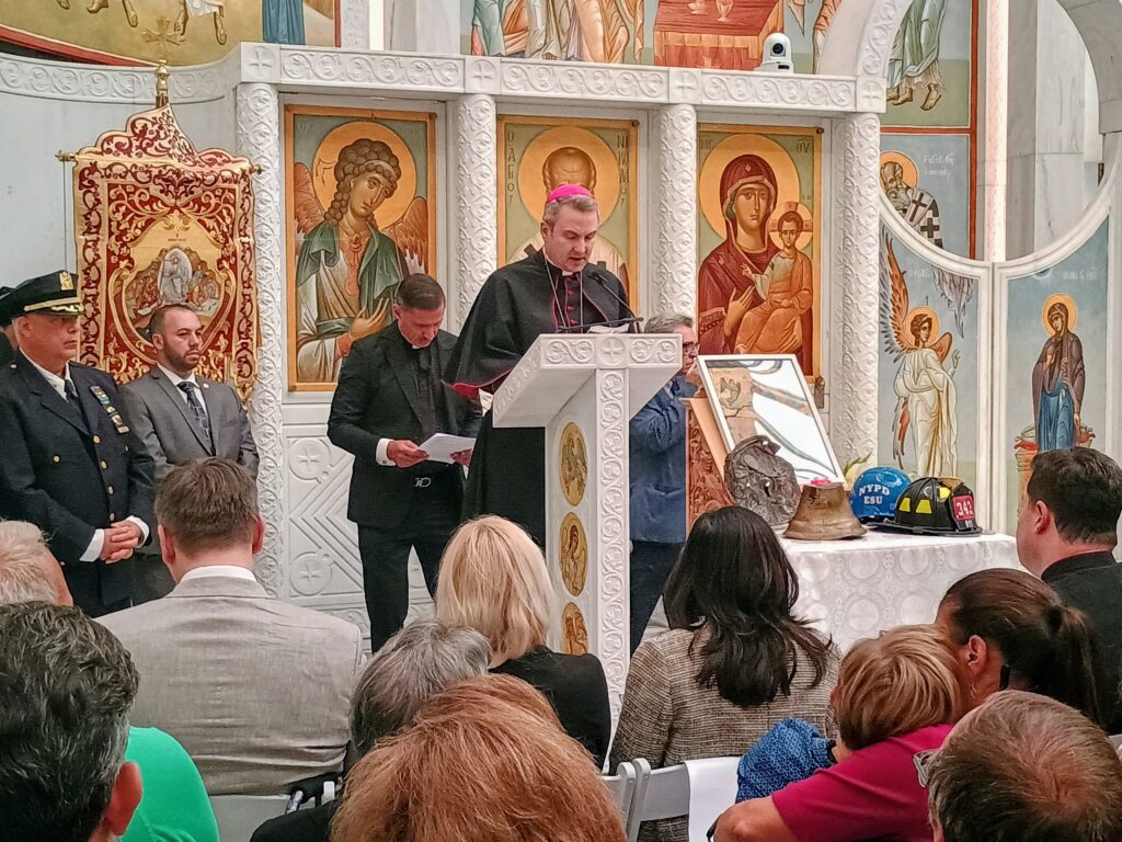 Archbishop Ronald Hicks (center) reads Psalm 23 at a 9/11 interfaith memorial service at St. Nicholas Greek Orthodox Church and National Shrine on Sept. 11, 2026.