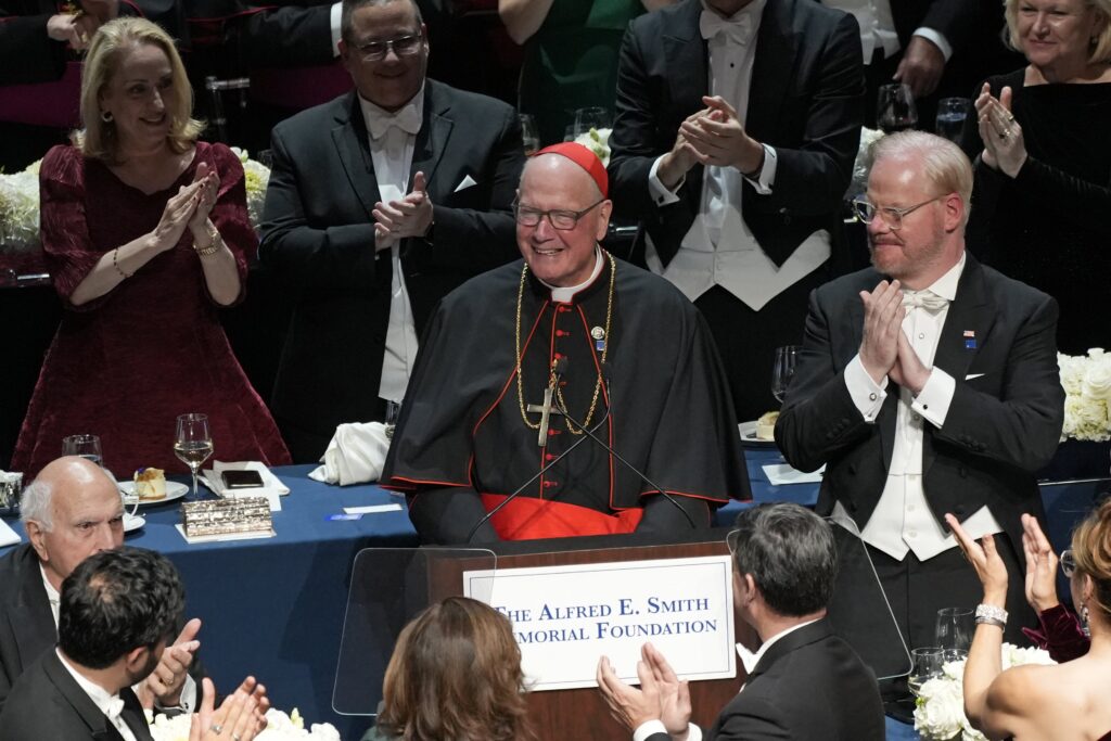 Cardinal Timothy M. Dolan, archbishop emeritus of New York, smiles after being introduced during the 81st annual Alfred E. Smith Memorial Foundation Dinner at the Waldorf Astoria in New York City Oct. 15, 2026. Cardinal Dolan delivered the event's keynote address. Photo: OSV News photo/Gregory A. Shemitz
