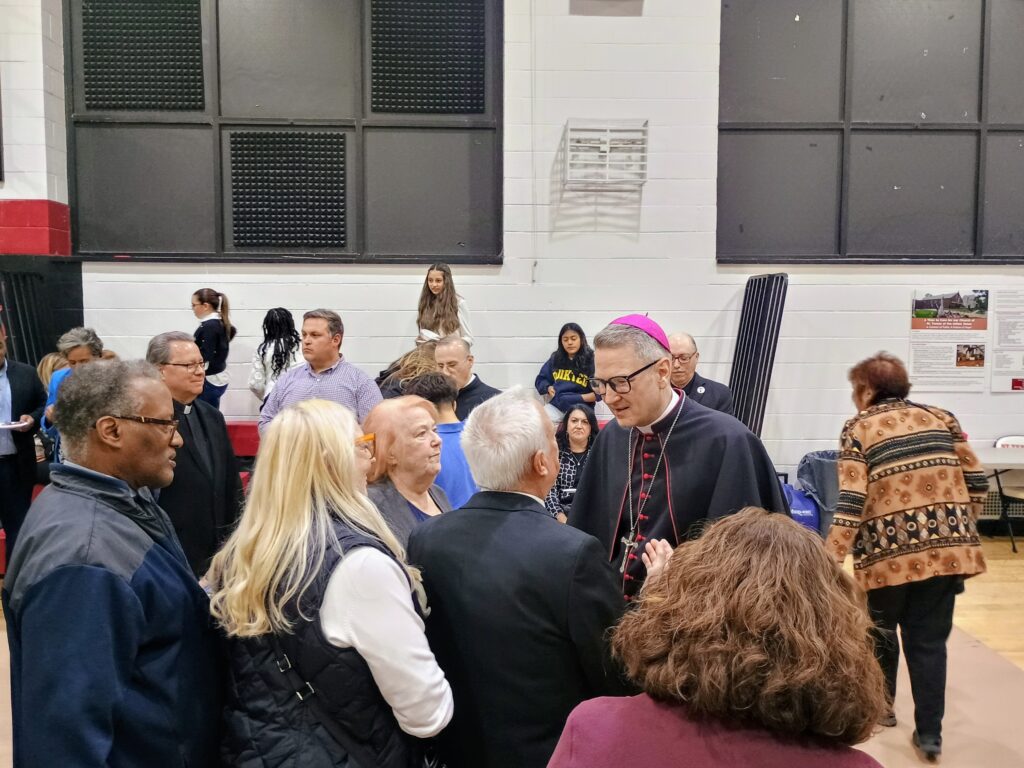 Archbishop Ronald Hicks greets the faithful during a reception that followed the Liturgy of the Hours Evening Prayer at St. Teresa of the Infant Jesus Church, Staten Island, Wednesday, Oct. 21, 2026.