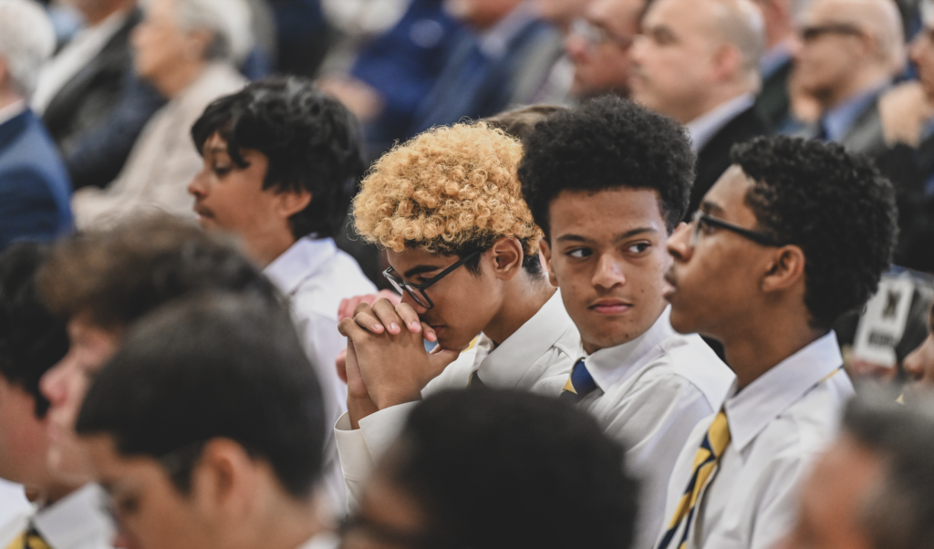 Students from Mount St. Michael Academy listen to a homily by Cardinal Timothy Dolan during the Bronx high school's 100th anniversary Mass on Sept. 29, 2026.
