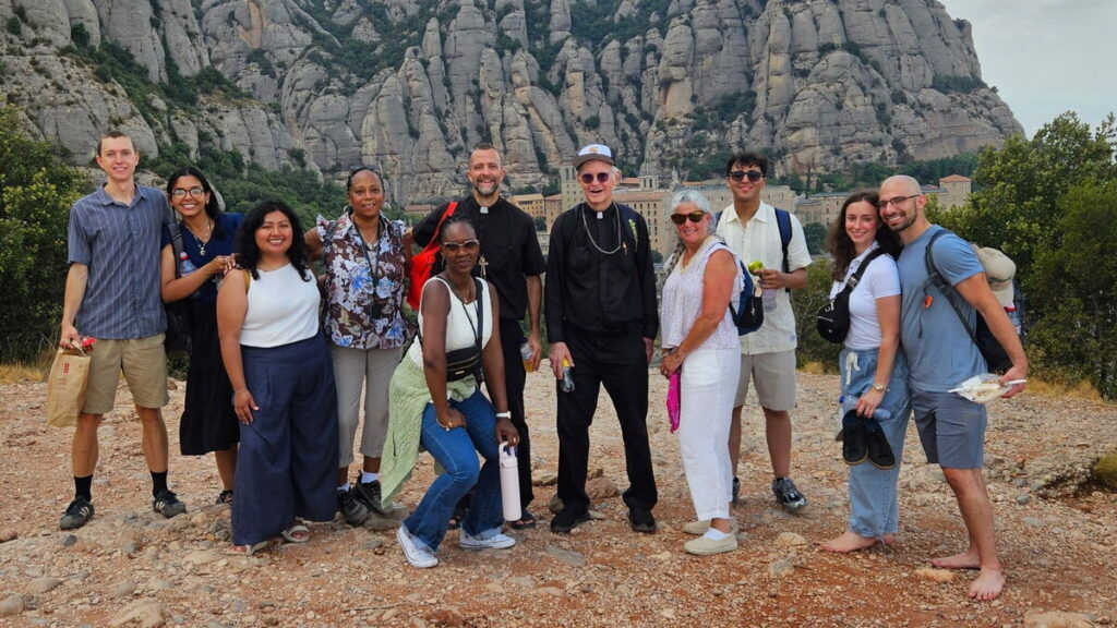 Father Vincent Druding (left) and Auxiliary Bishop Peter Byrne with some of the more than 20 residents from New York and Connecticut who were on the Camino de Santiago in Spain in August 2026.
