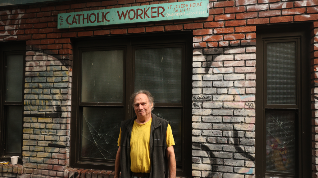 Bud Courtney stands in front of the entrance for the Catholic Worker’s St. Joseph’s House of Hospitality at 36 E. First Street in Lower Manhattan.