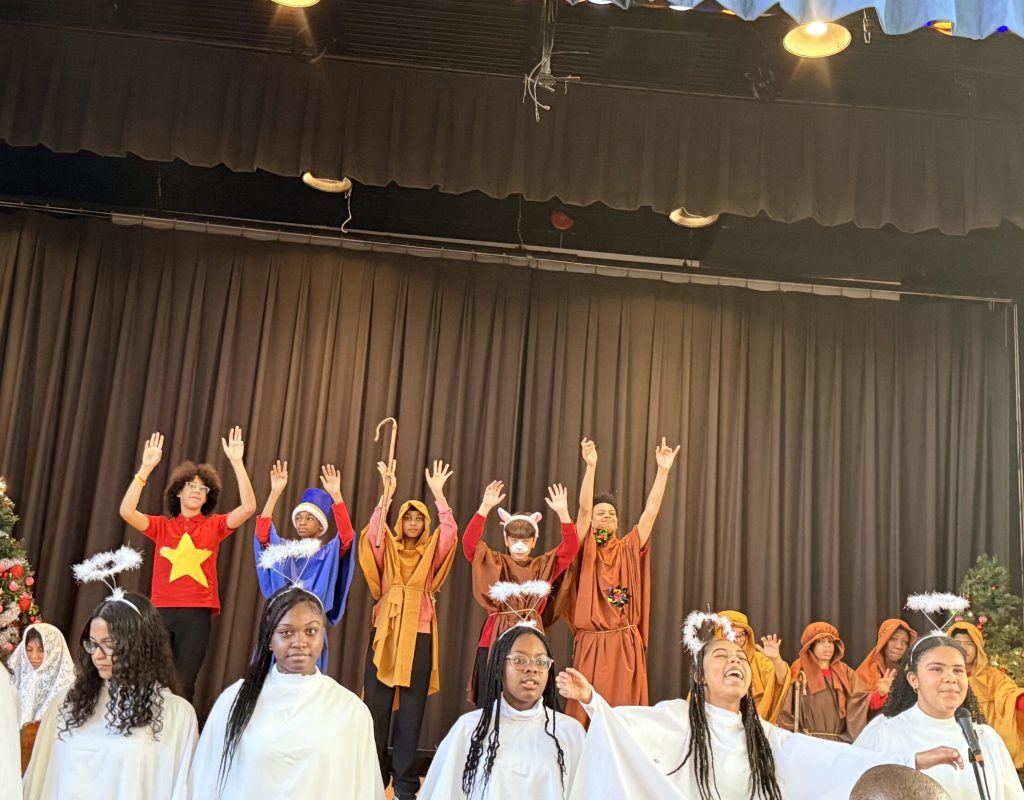 Eighth grade students perform a modern version of the Nativity at Our Lady of Victory School in Mount Vernon. Photo courtesy of Principal Helena Castilla-Byrne.