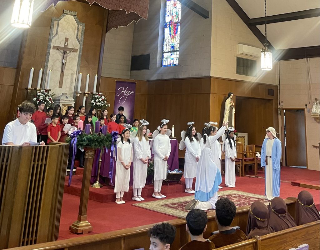 St. Teresa-St. Rita STREAM Academy fourth-grade singers, fifth-grade performers, and eighth-grade narrators perform a depiction of the Living Nativity on Thursday, December 11, 2025. Photos courtesy of St. Teresa-St. Rita STREAM Academy