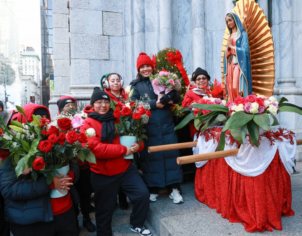 Volunteers gather around the pilgrim statue of Our Lady of Guadalupe after making its way from the Shrine at Our Lady of Guadalupe to Saint Patrick’s Cathedral before a feast day Mass on December 12, 2025. Photo by Joe Vericker/Photobureau
