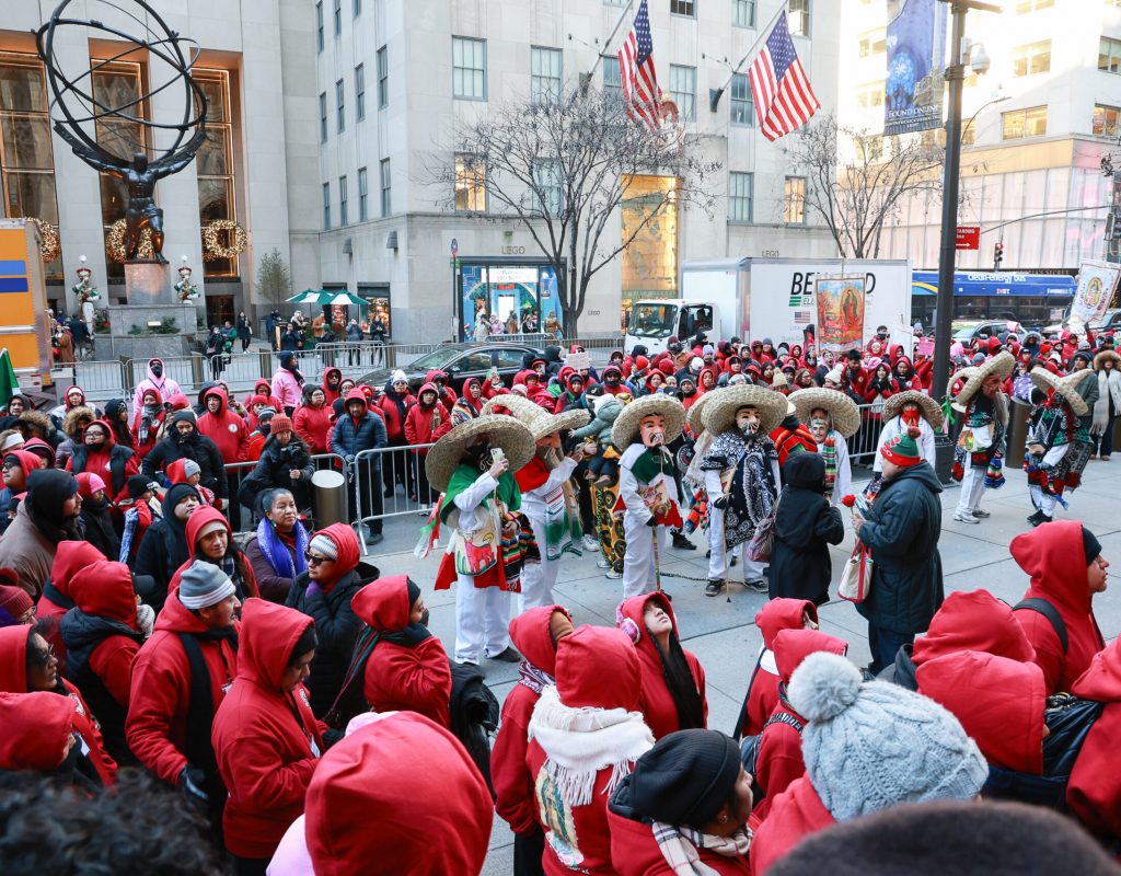 Traditional Mexican dancers perform outside of Saint Patrick’s Cathedral as thousands gather in celebration of the Feast of Our Lady of Guadalupe on December 12, 2025. Photo by Joe Vericker/Photobureau