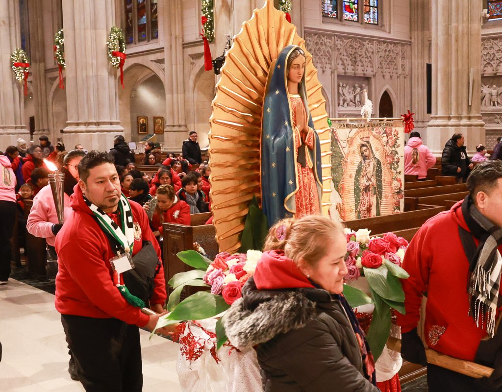 The pilgrim statue of Our Lady of Guadalupe is processed into Saint Patrick’s Cathedral on December 12, 2025. Photo by Joe Vericker/Photobureau